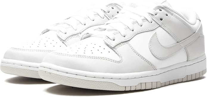 Women's Nike Dunk Low sneakers, white leather upper with lace-up eyelets and swoosh