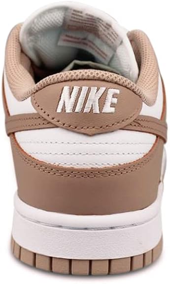 Women's Nike Dunk Low sneakers heel with NIKE logo patch and tan leather upper