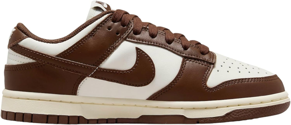 Women’s Nike Dunk Low sneakers in sail white and cocoa brown, lace-up with Nike swoosh.