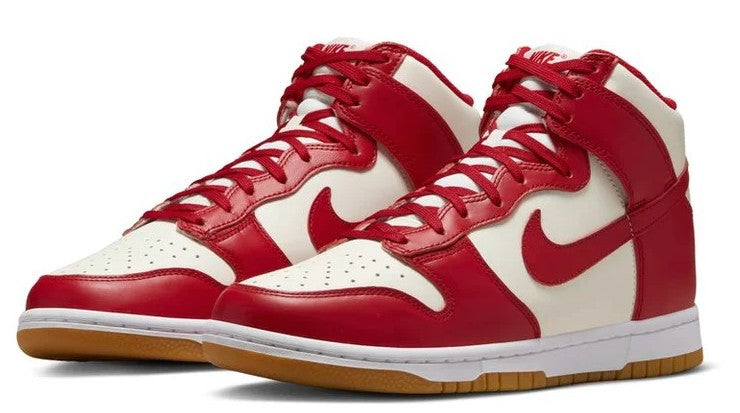 Pair of women's Nike Dunk High sneakers, red and white panels with wing logo