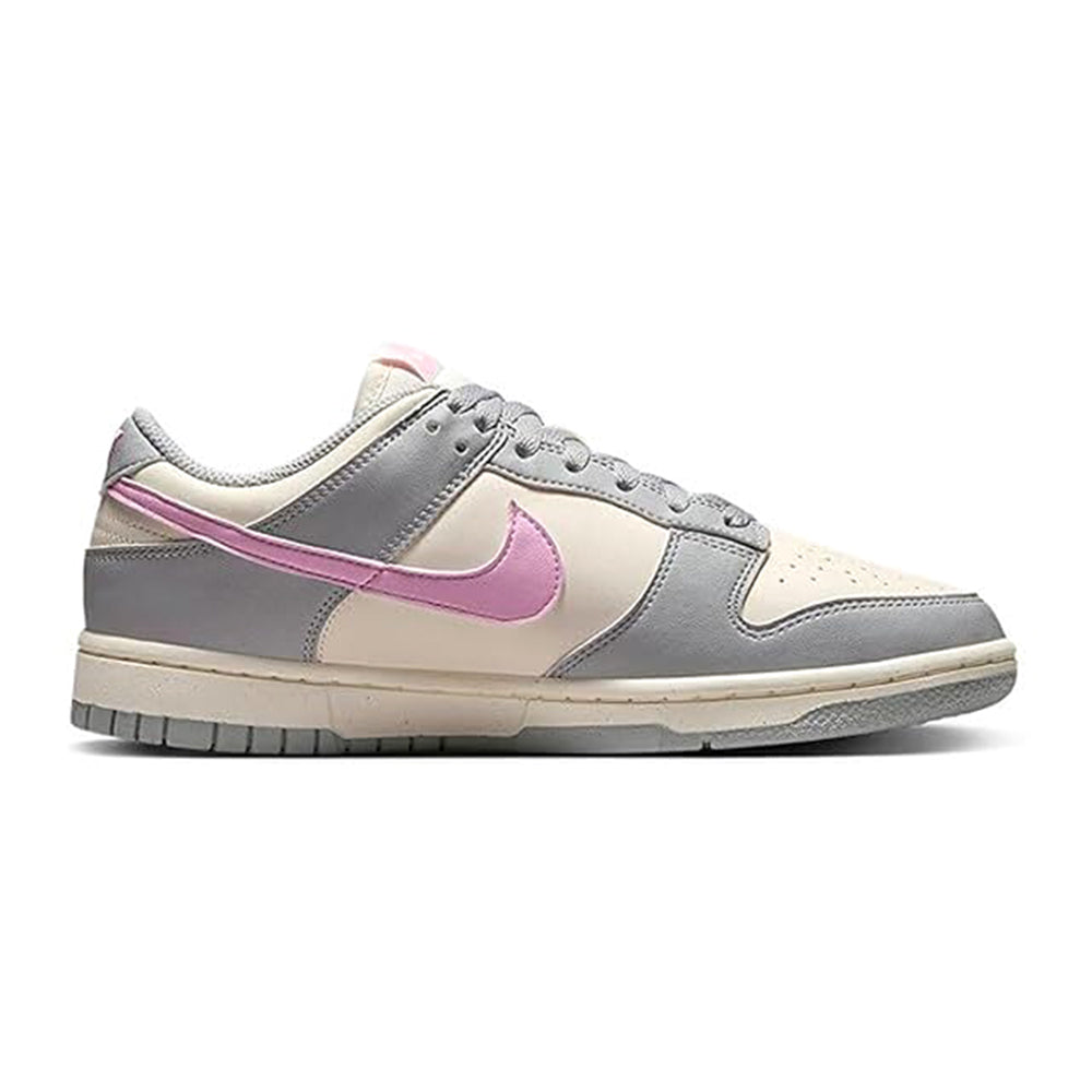 Low-top Nike Dunk sneakers, grey uppers with pink swoosh and beige side panels