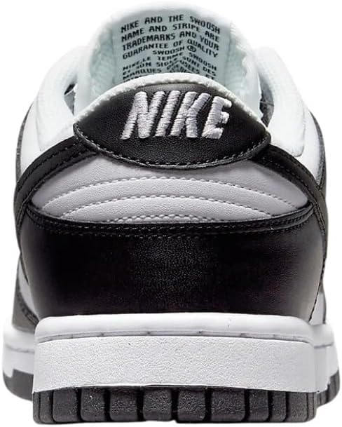 Heel of a white-and-black low-top sneaker with Nike branding on the collar