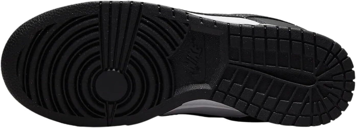Black rubber outsole of a low-top sneaker with tread pattern