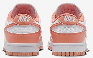 Women's Nike Dunk Low heel view with Nike logo and coral ankle collar