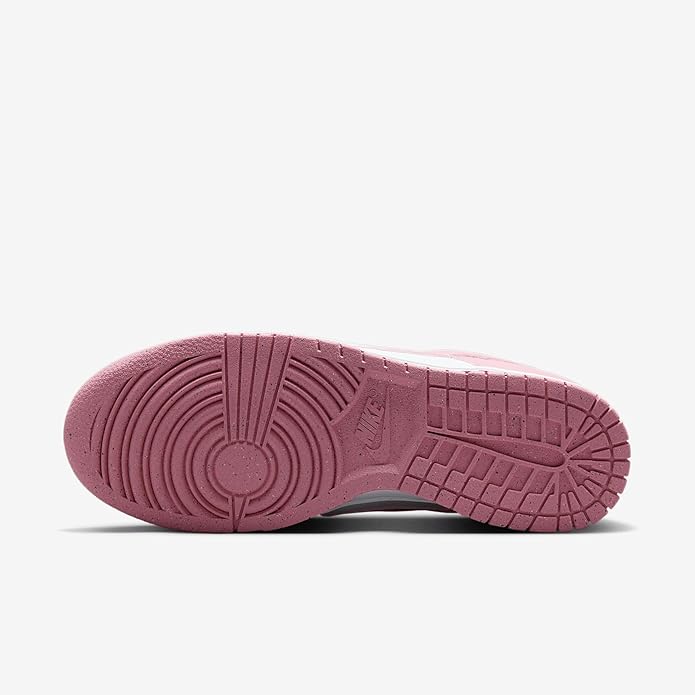 Pink rubber outsole for low-top sneakers with textured traction pattern
