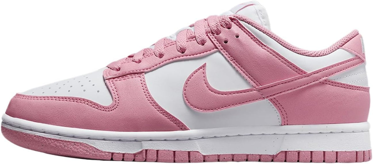 Low-top lace-up sneakers with pink suede overlays, white panels, and pink Nike swoosh