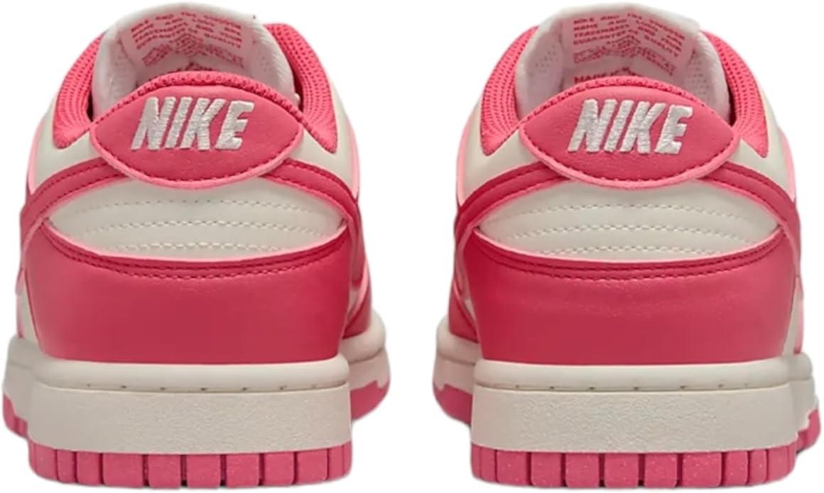Pink and sail Nike Dunk sneakers, with Nike logo on back and heel tabs.
