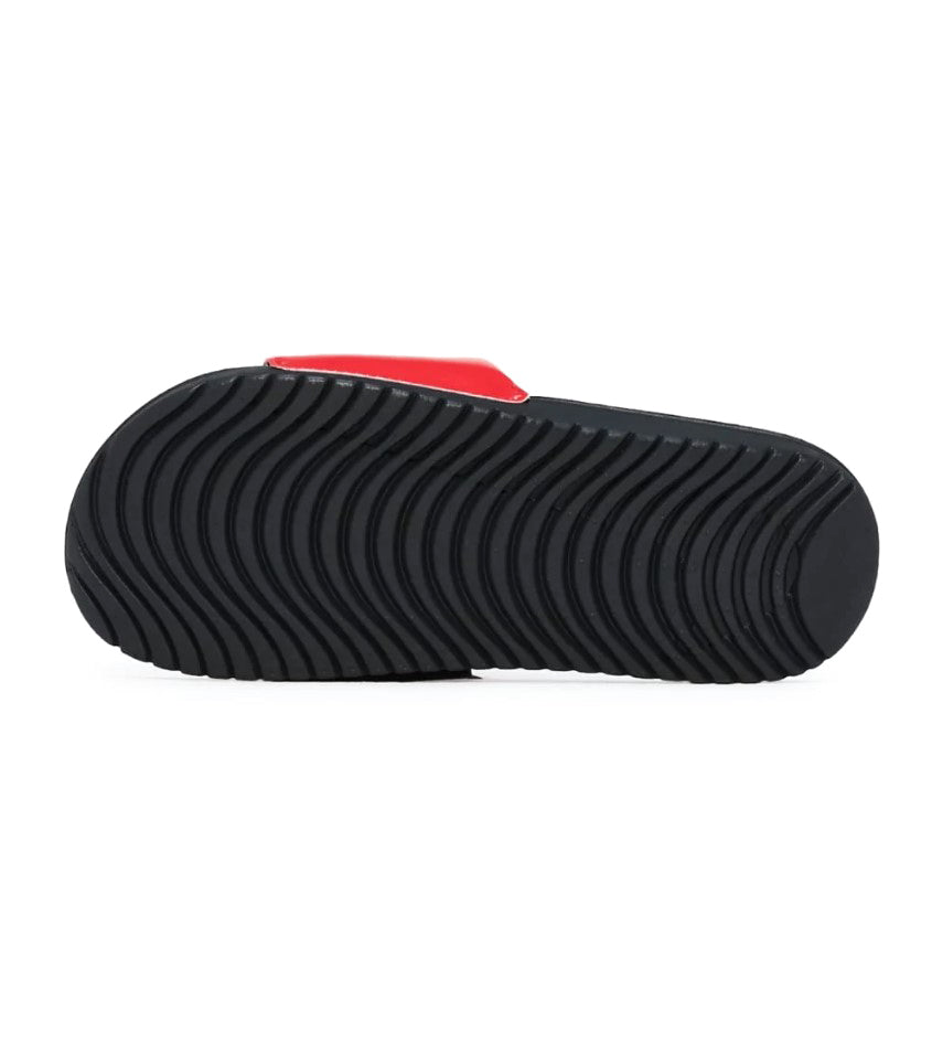 Kids Nike Kawa Slide sandals outsole, textured black tread with red strap