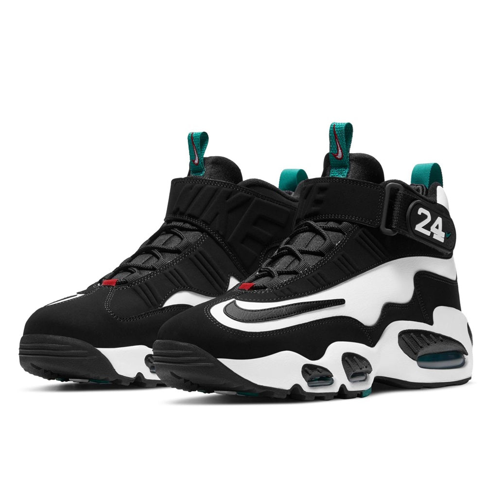 Men's Nike high-top sneakers with twin teal heel loops and black-and-white wavy panels