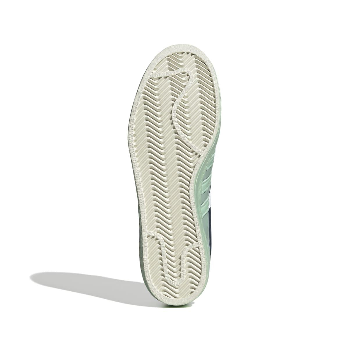 Rubber outsole for low-top trainers with ribbed tread in off-white