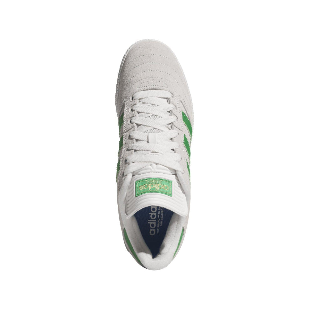 White leather-look sneaker with green stripes and lace-up opening.