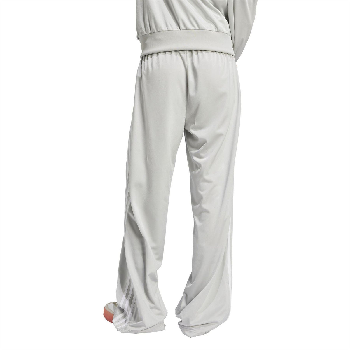 Grey adidas Originals track pants with ribbed waistband and wide ankle cuffs