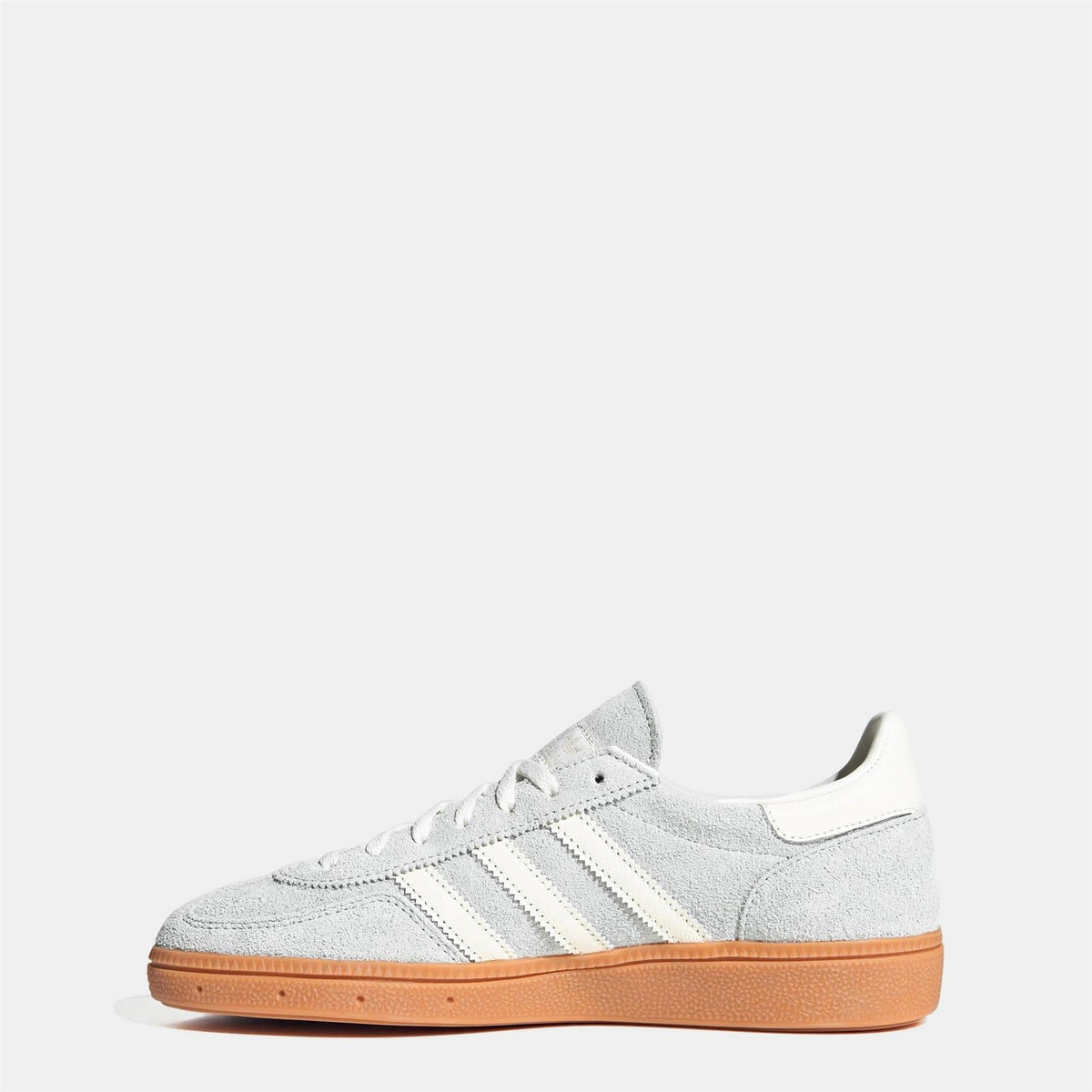 White suede low-top sneaker with lace-up closure and three stripe detailing