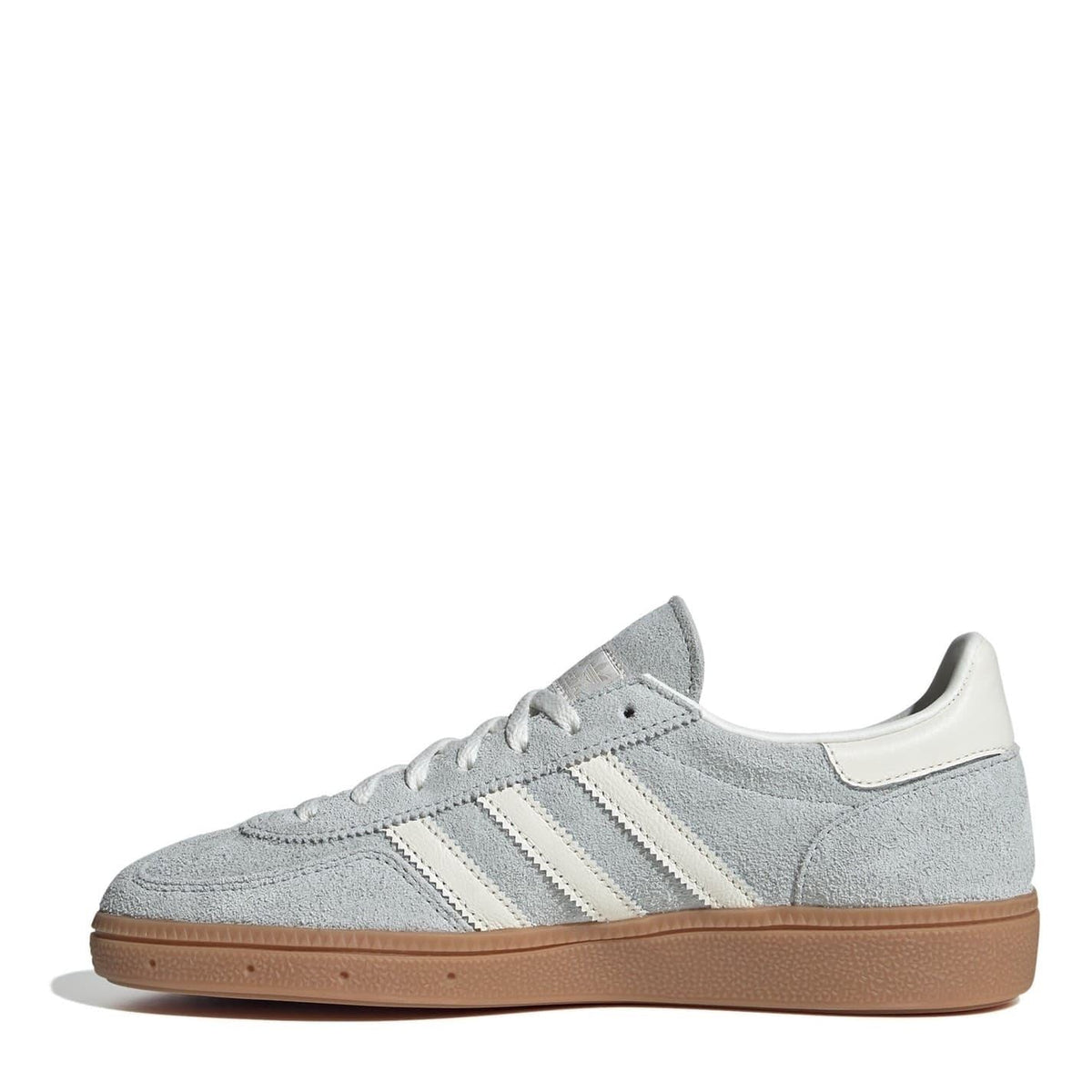 Light gray low-top sneakers, side view with white stripes and brown gum outsole