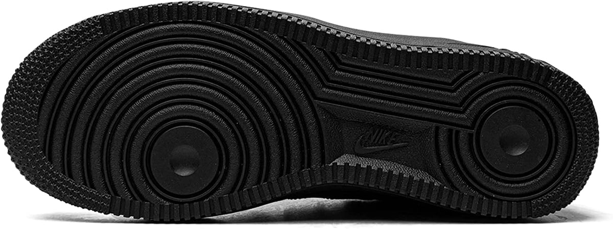 Black rubber outsole with circular traction tread pattern
