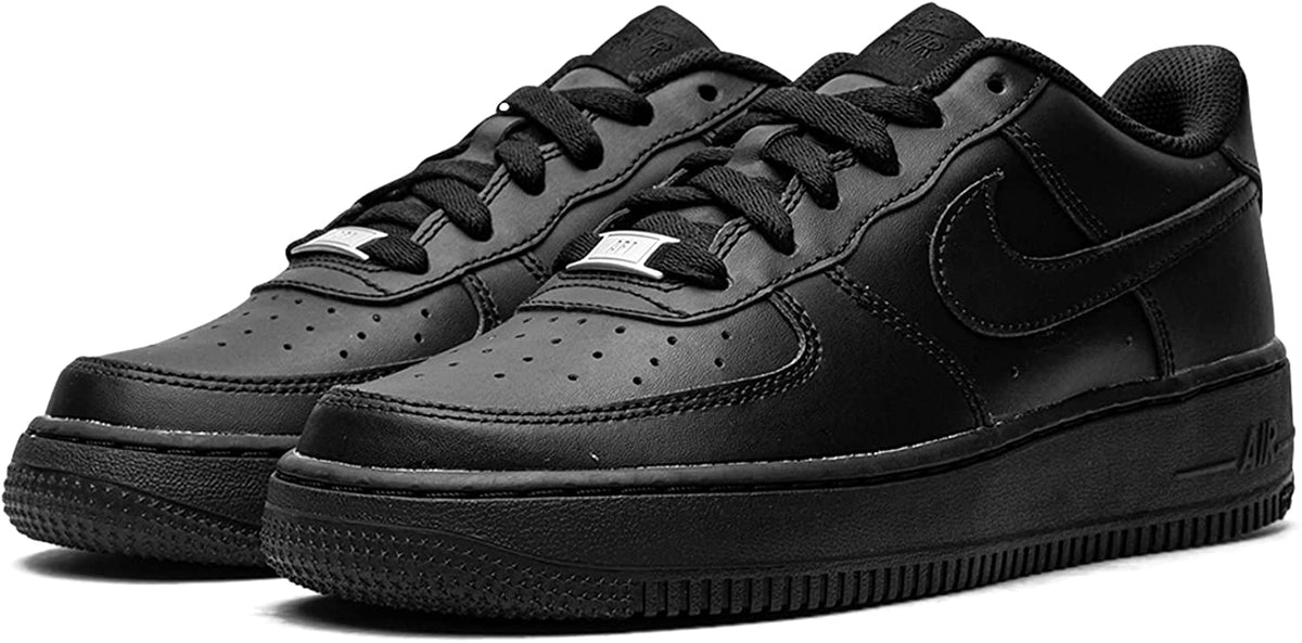 Black leather lace-up sneakers with Nike swoosh, angled side view pair