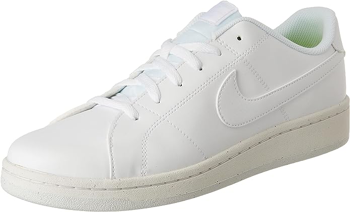 White low-top sneakers with lace-up front and Nike swoosh detail on side