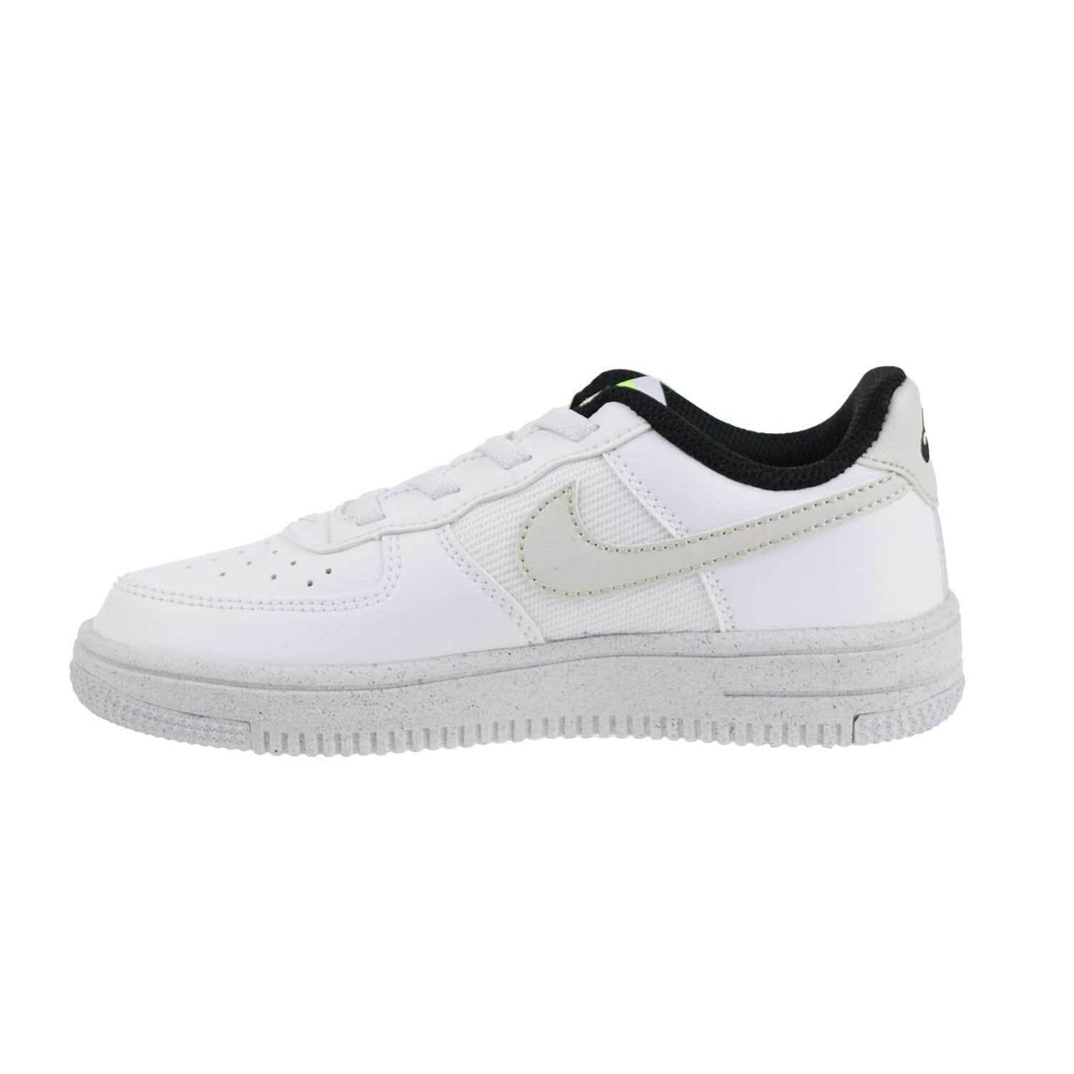 Kids' Nike low-top sneakers with white leather, beige swoosh, black collar, gray sole