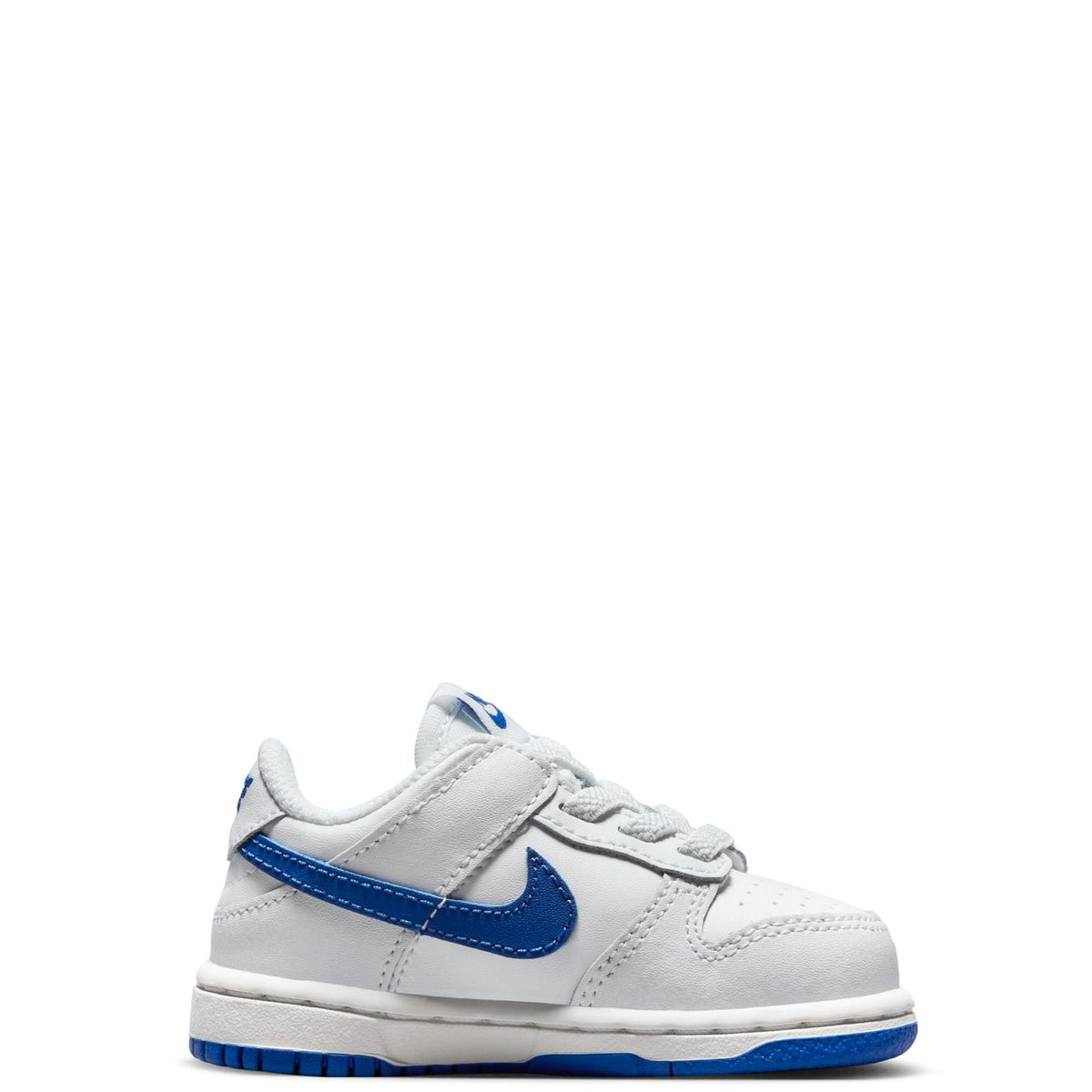 Low-top toddler sneakers, white with blue swoosh and lace-up front
