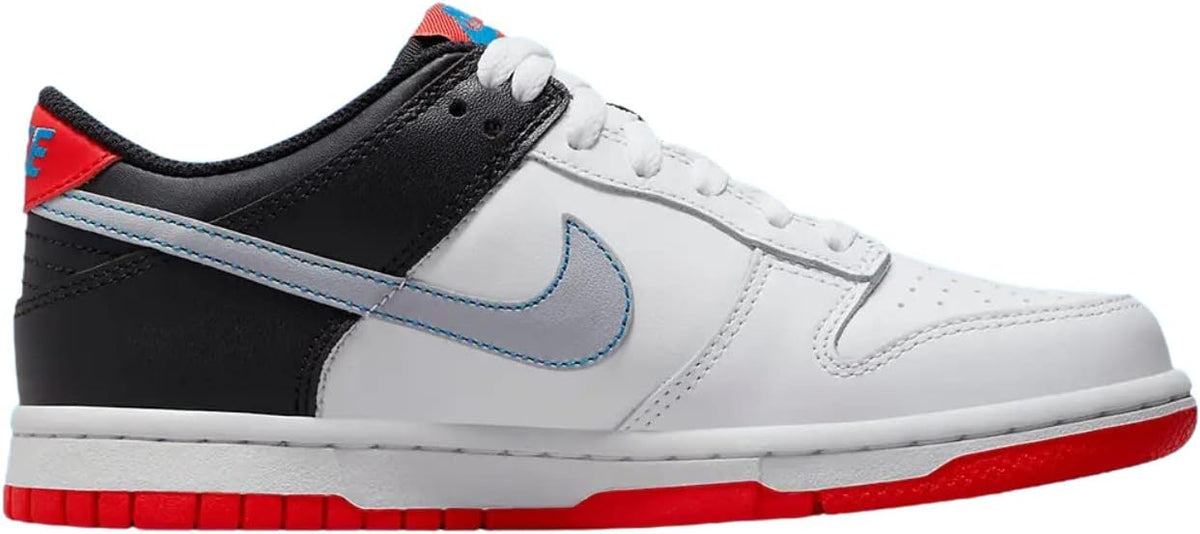 Big kid Nike Dunk Low sneakers in white with black panels, light blue swoosh, red outsole