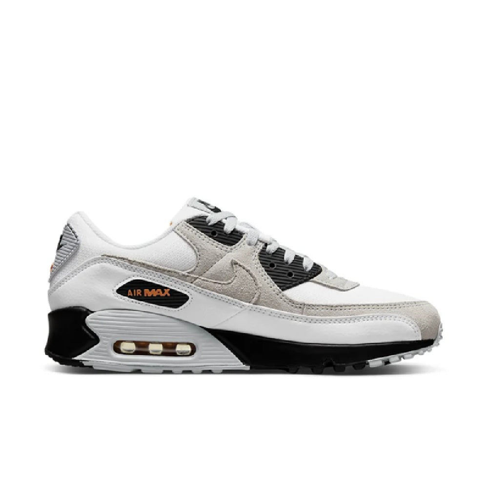 White running sneakers with black accents, lace-up, and cushioned air sole