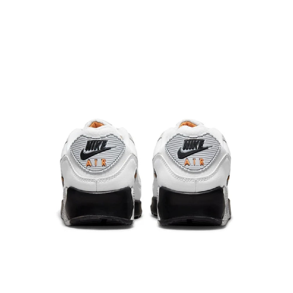 Back view white sneakers with Nike swoosh and Air heel branding, black heel caps