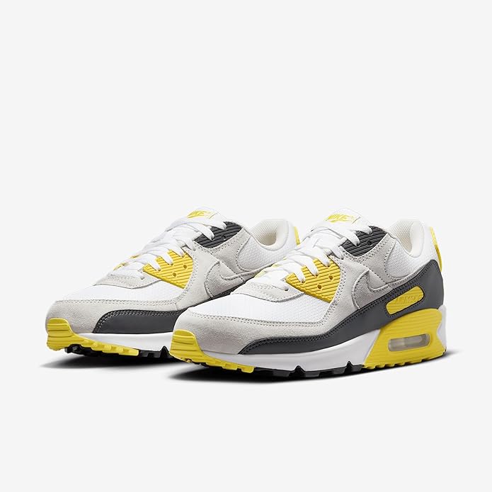 Men's Nike Air Max 90 sneakers, white upper with grey overlays and yellow lace loops