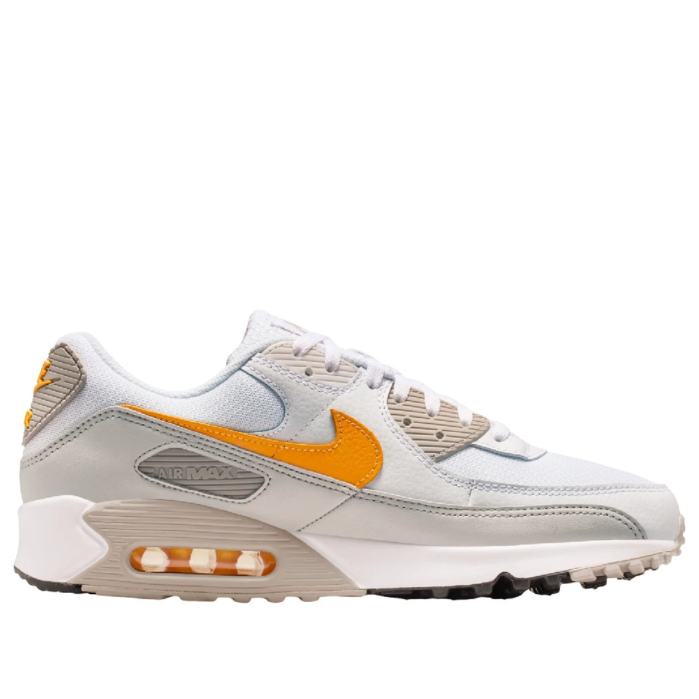 Nike Air Max 90 low-top sneakers, white upper with orange accents and visible Air sole