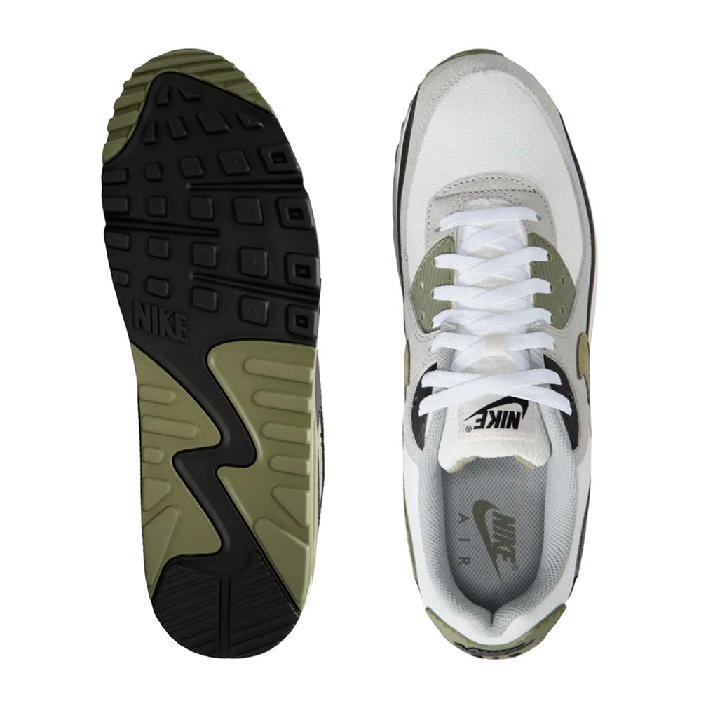 Men's Nike Air Max 90 sneakers outsole and side view with tread and white upper