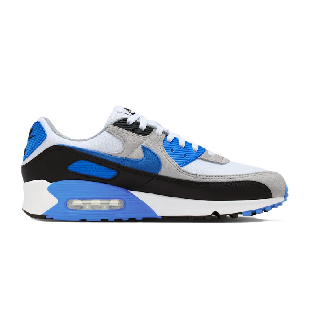 Nike Air Max 90 sneakers in white, blue, and black with visible air unit