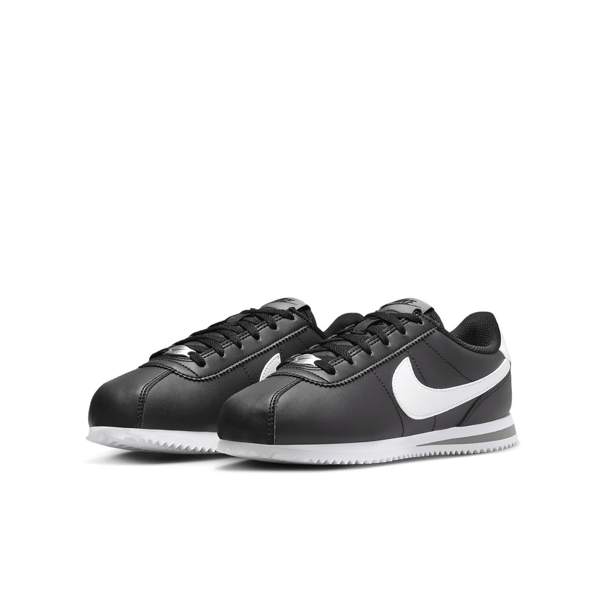 Kids' Nike Cortez sneakers, black leather with white swoosh and lace-up front
