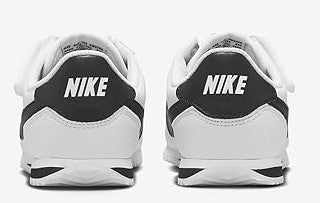 Little kid's Nike sneakers, white with black heel collar and Nike logo