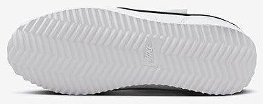 Rubber outsole tread for Nike kids sneakers, textured grip pattern