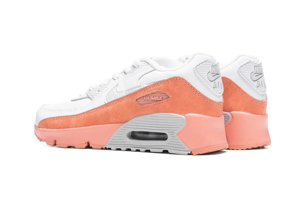 Kids' Nike Air Max 90 sneaker heel and side, white upper with orange panels