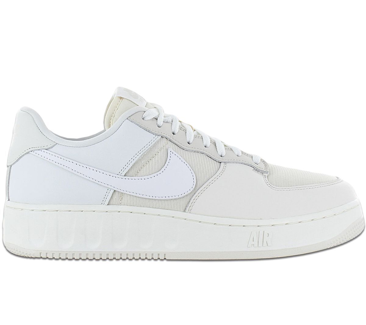Nike Air Force 1 Low sneakers in light cream and white, lace-up with swoosh logo