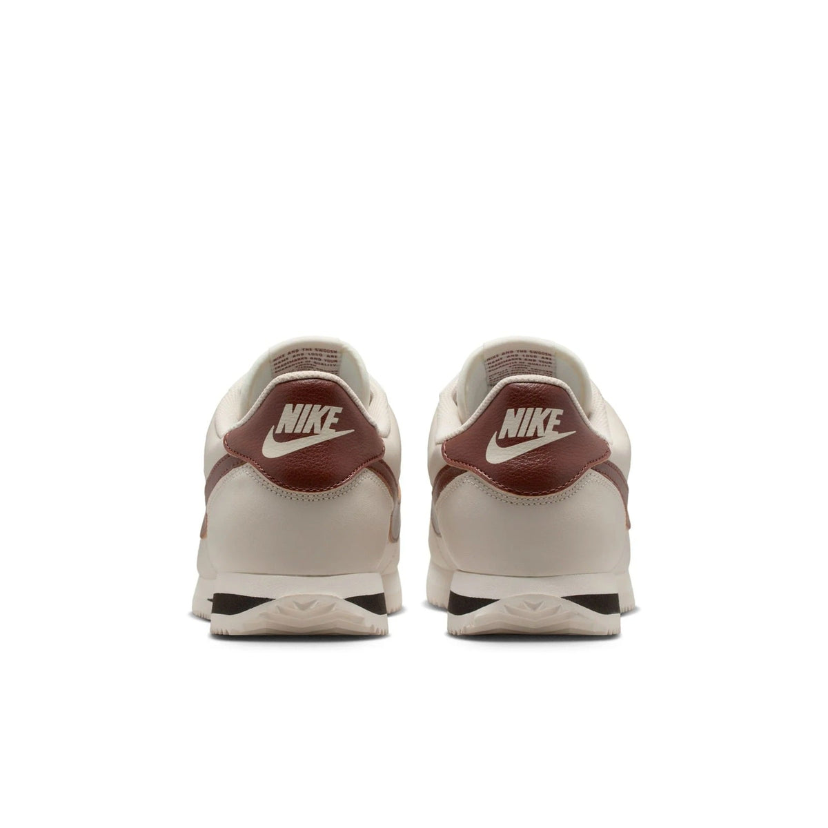 Nike Cortez LT sneakers, cream back view with brown NIKE heel branding