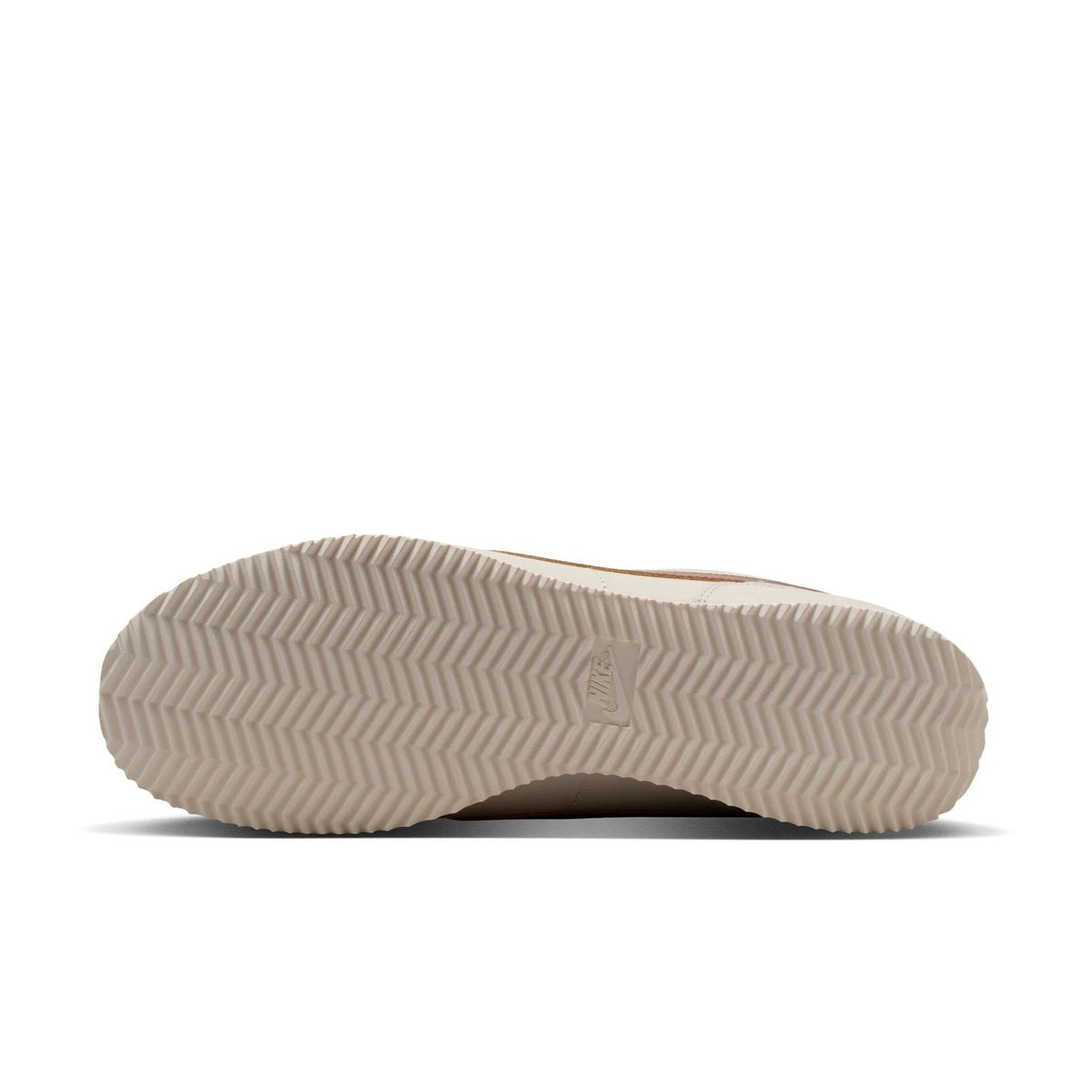 Nike Cortez LT rubber outsole, textured zigzag tread on light sole