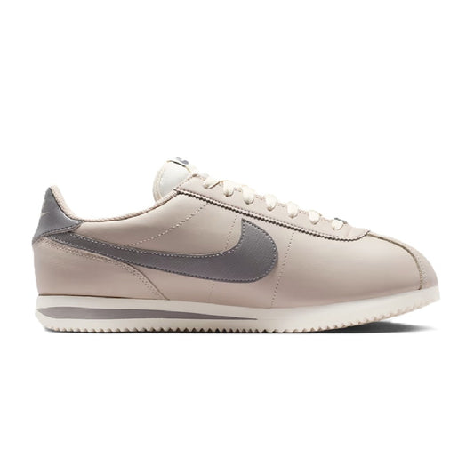 Nike low-top lace-up sneakers in cream with gray Swoosh and side panels