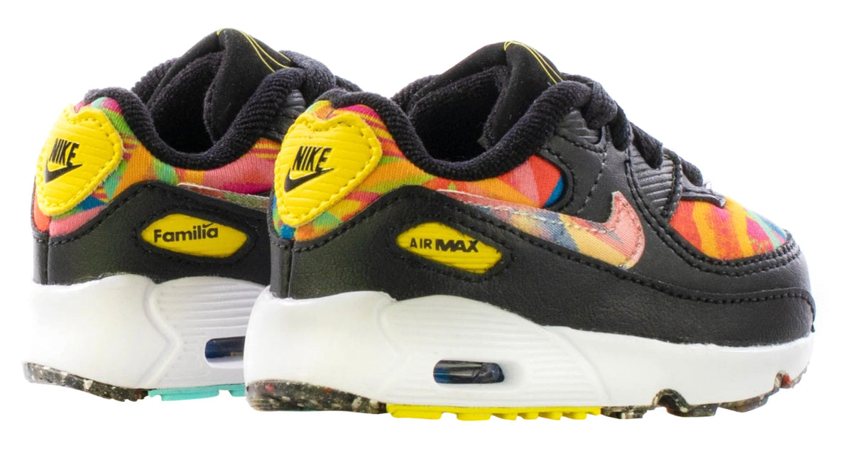 Toddler Air Max 90 sneakers, side view with multicolor swoosh and cushioned heel