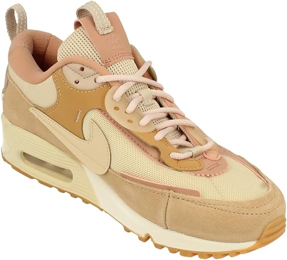 Women's Nike Air Max 90 sneakers angled side view with lace-up mesh and tan rubber midsole
