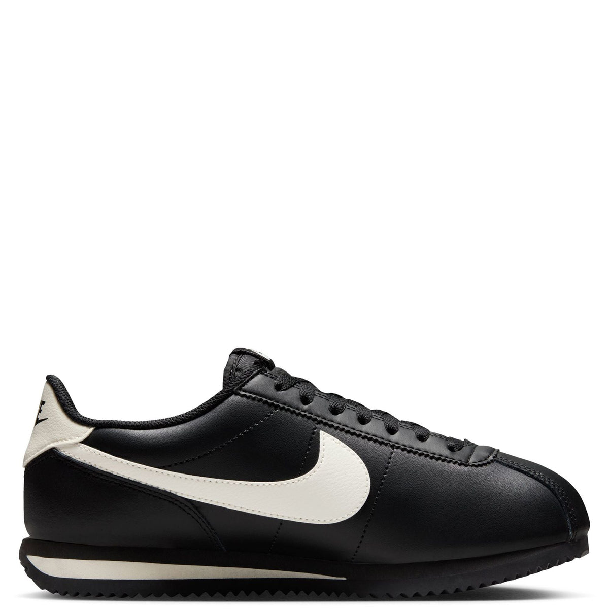 Nike Cortez low-top sneakers, black upper with pale ivory side swoosh and laces