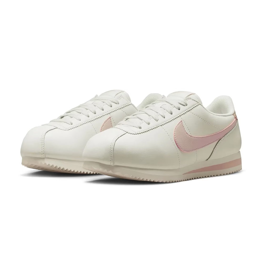Nike Cortez low-top sneakers, front view: white upper with pink Swoosh
