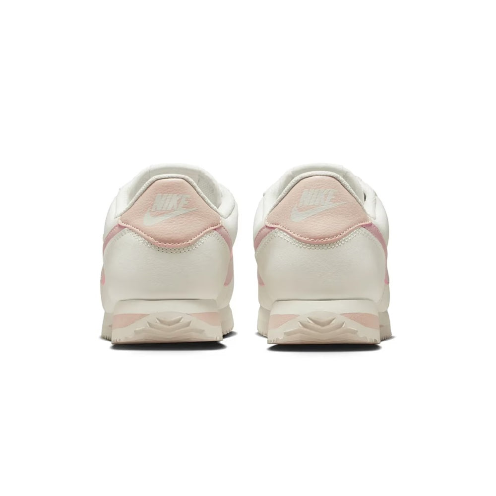 Nike Cortez sneakers, heel view with Nike branding and pink collar accents