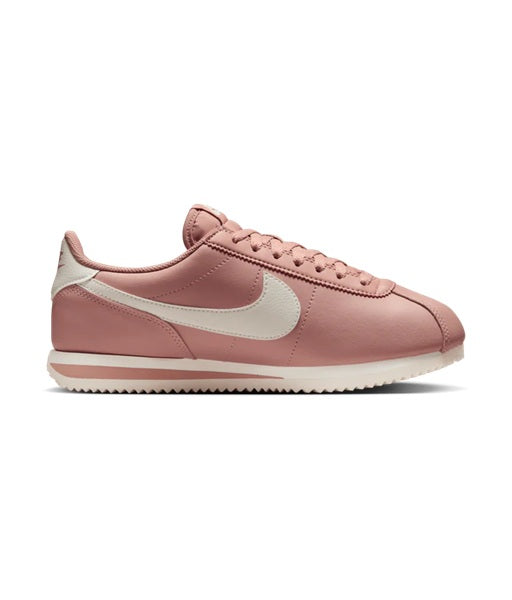 Women's pink Nike Cortez low-top sneaker with Sail side panel and lace-up