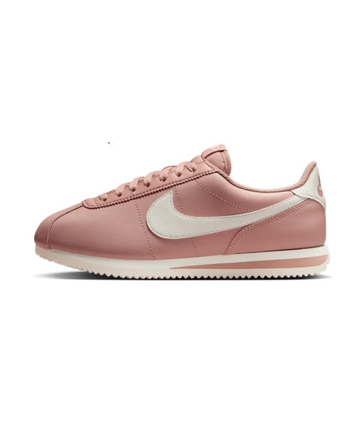 Women's pink Nike Cortez low-top sneaker with Sail swoosh and lace-up closure
