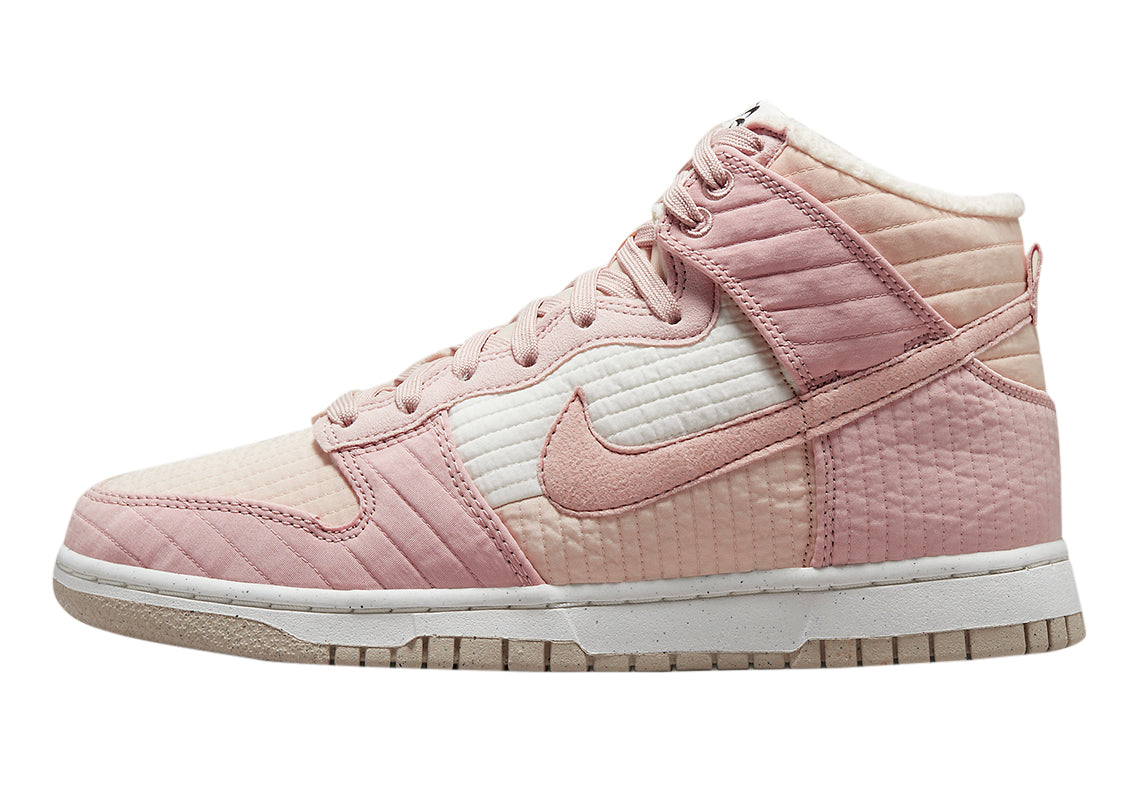 Women's high-top sneakers in light pink with Nike swoosh and lace-up front