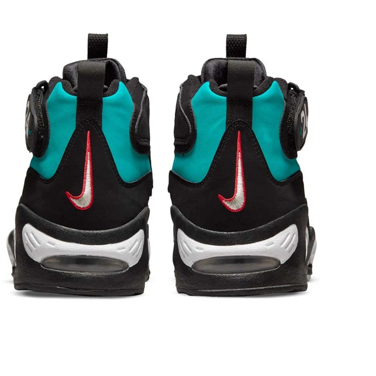 Black high-top sneakers with teal back panels and red Nike swoosh