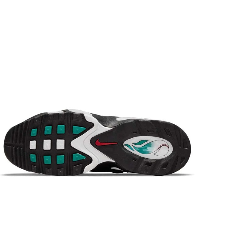 Black rubber outsole with teal traction pads and curved swoosh logo