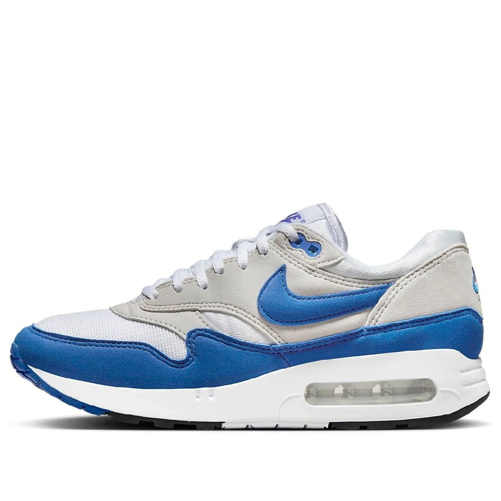 Women's Nike Air Max 86 OG sneakers in white and royal blue, side view with lace-up