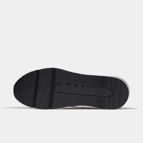 Black rubber outsole of Nike Air Max sneakers with ribbed traction pattern